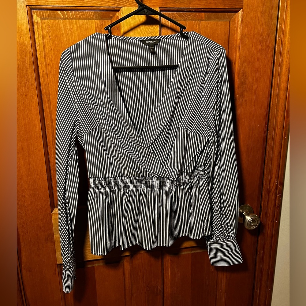 Express Top. Navy and white stripes. Buttons on cuff. V neckline. Size M.